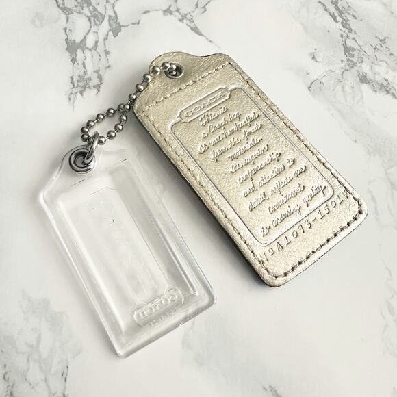 Coach 3” Pale Gold Metallic Hangtag Creed w/ Clear Coach Hangtag Bag Charm - Picture 1 of 5